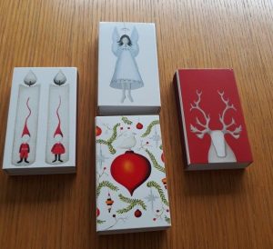 Four Festive matchboxes, 110 x 65 x 20 mm each